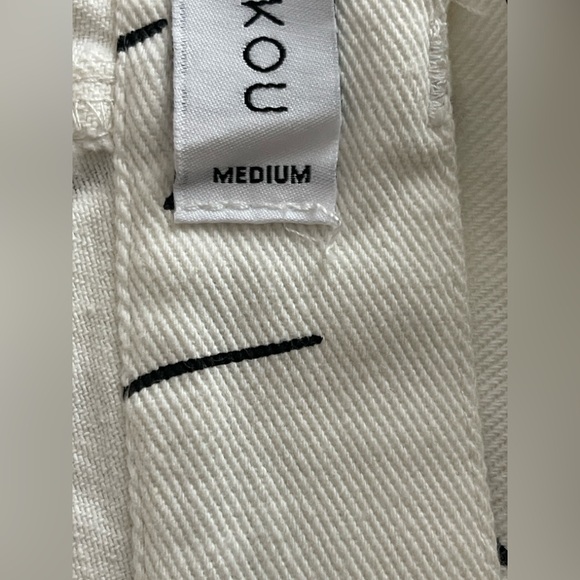 Shekou "Little Things" white denim jeans with a black abstract face print EUC - Picture 5 of 6